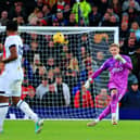 Luton keeper Thomas Kaminski clears the danger at Old Trafford - pic: Liam Smith