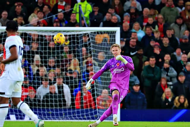 Luton keeper Thomas Kaminski clears the danger at Old Trafford - pic: Liam Smith