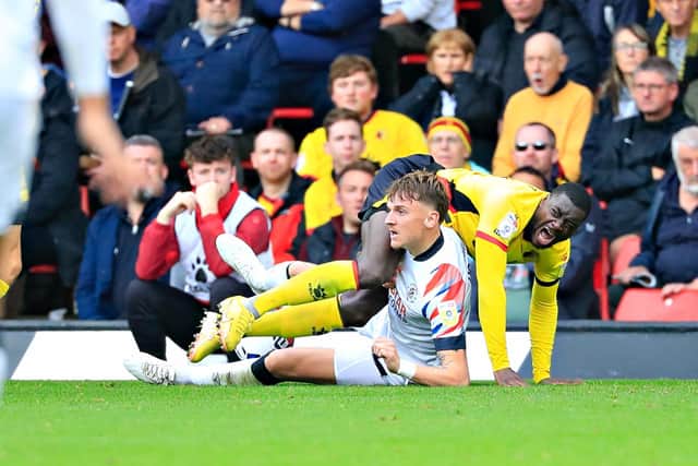 Alfie Doughty puts in a challenge against Watford last weekend