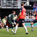Kal Naismith chests the ball back to keeper Josh Keeley during Luton's 1-0 loss to Cardiff City - pic: Liam Smith
