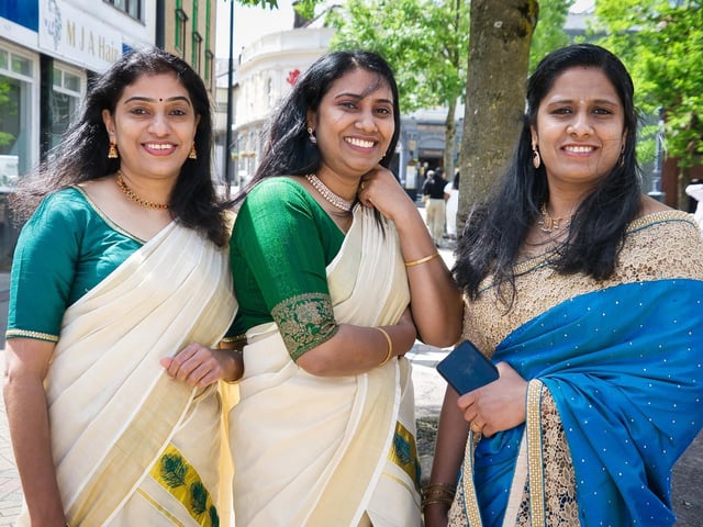 It was smiles all around for these ladies wearing their traditional sarees.