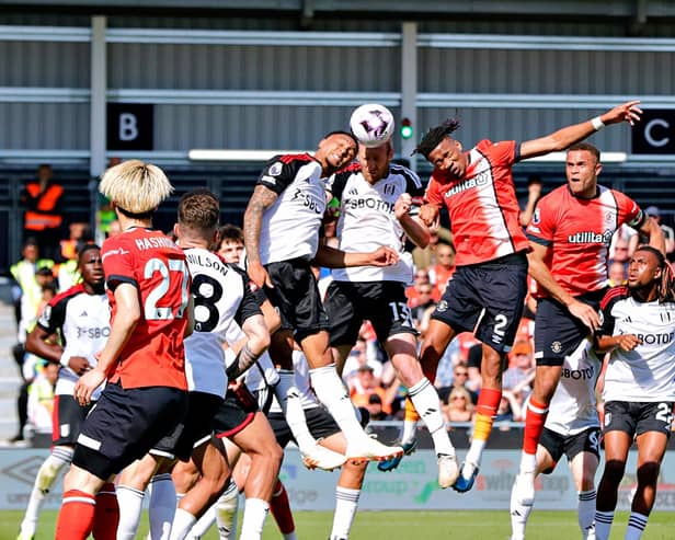 Gabe Osho gets up to try and win a header against Fulham - pic: Liam Smith