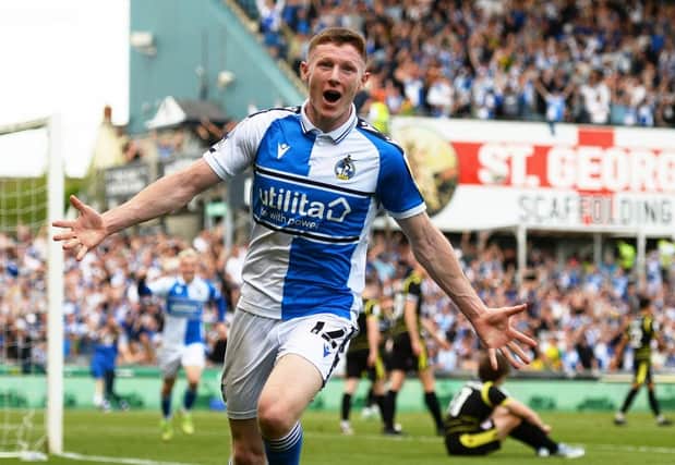 Elliot Anderson celebrates scoring the seventh goal for Bristol Rovers as they beat Scunthorpe United on the final day of the 2021-22 season