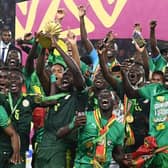 Senegal's players celebrate winning the 2021 Africa Cup of Nations - pic: CHARLY TRIBALLEAU/AFP via Getty Images