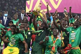 Senegal's players celebrate winning the 2021 Africa Cup of Nations - pic: CHARLY TRIBALLEAU/AFP via Getty Images