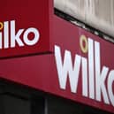 Signage outside a branch of the British high-street retail chain "Wilko". Photo by JUSTIN TALLIS/AFP via Getty Images
