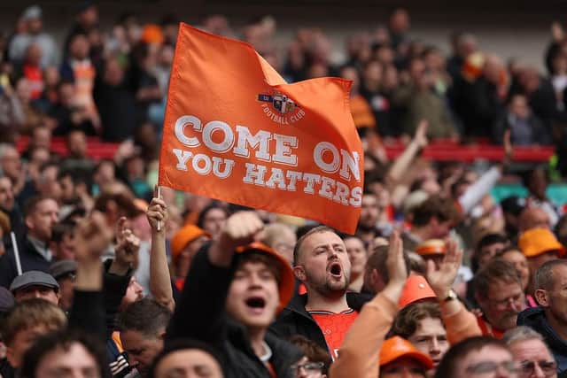 Luton's supporters cheer their team on against Stockport on Sunday - pic: Jasper Wax/Getty Images