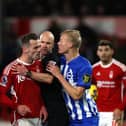 Anthony Taylor intervenes as Harry Toffolo and Jan Paul van Hecke clash during Nottingham Forest's 3-2 defeat to Brighton on Saturday - pic: Eddie Keogh/Getty Images