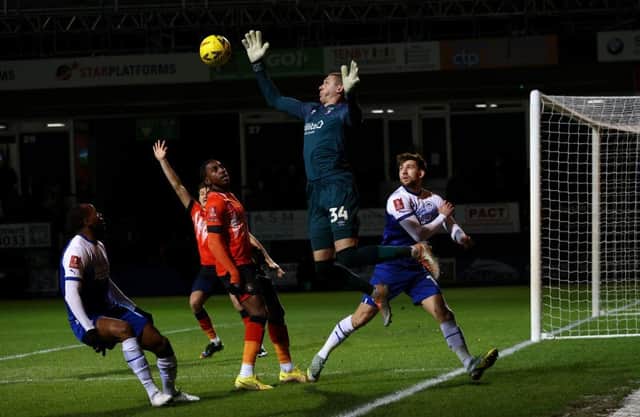Town keeper Ethan Horvath during the third round clash against Wigan Athletic