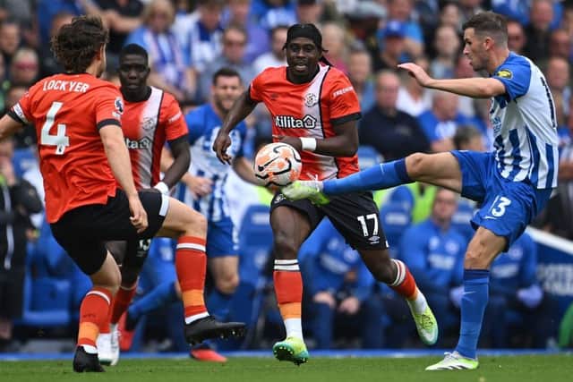 Action from the Hatters' opening day 4-1 defeat against Brighton - pic: JUSTIN TALLIS/AFP via Getty Images