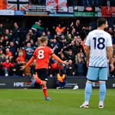 Midfielder Luke Berry wheels away after scoring Luton's late equaliser against Nottingham Forest - pic: Liam Smith