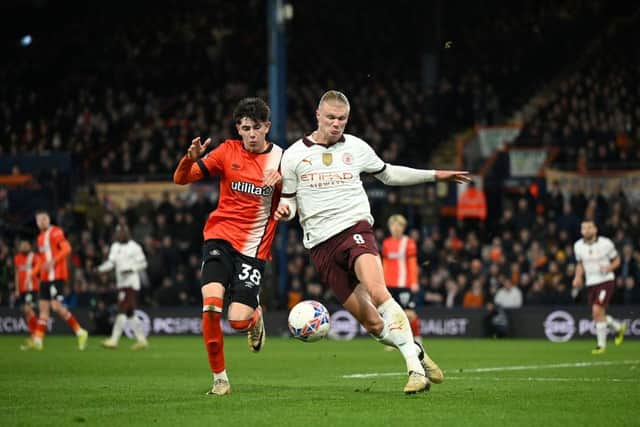 Luton defender Joe Johnson comes up against Manchester City's Erling Haaland in their FA Cup tie at Kenilworth Road - pic: Shaun Botterill/Getty Images