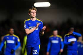 AFC Wimbledon midfielder Jack Rudoni is expected to go to Huddersfield