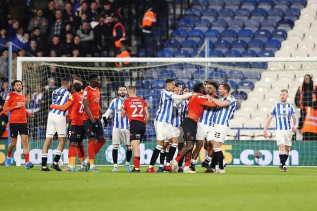 Fred Onyedinma gets involved in a melee following Elijah Adebayo's penalty miss at Huddersfield recently
