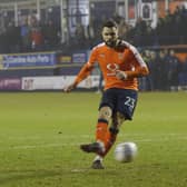 Former Hatter Josh McQuoid scores a penalty for the Hatters