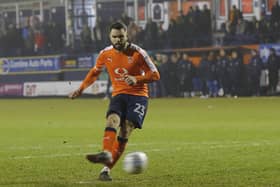 Former Hatter Josh McQuoid scores a penalty for the Hatters