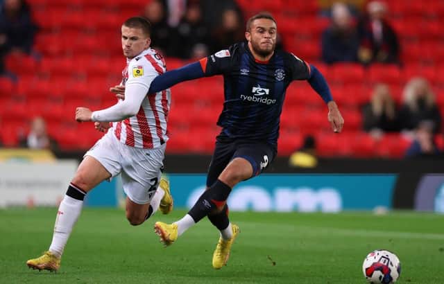 Carlton Morris looks to get forward against Stoke City on Tuesday night