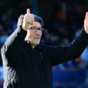 Mick Harford gives a thumbs up to the Luton crowd against Harrogate earlier this year
