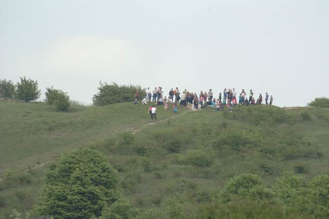 Library photo of walkers rambling up Warden Hills,
