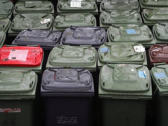 Wheelie bins for recycling are seen at a recycling centre. Photo by Christopher Furlong/Getty Images