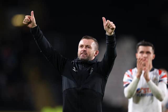 Nathan Jones celebrates another away victory at Hull recently