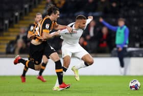 Carlton Morris looks to get away from Hull defender Jacob Greaves recently