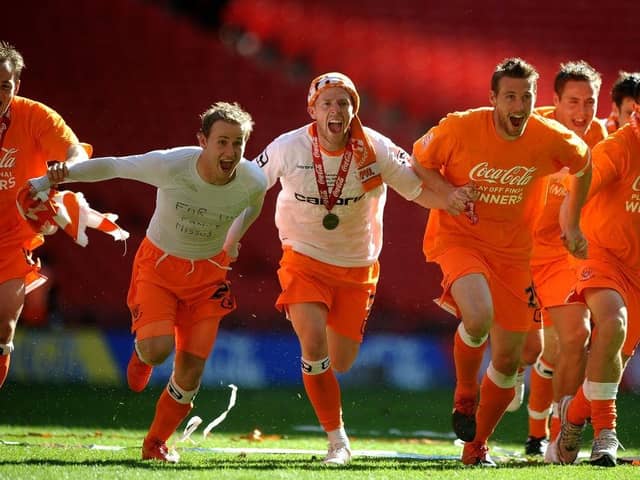 Rob Edwards celebrates winning promotion with Blackpool under Ian Holloway back in 2010