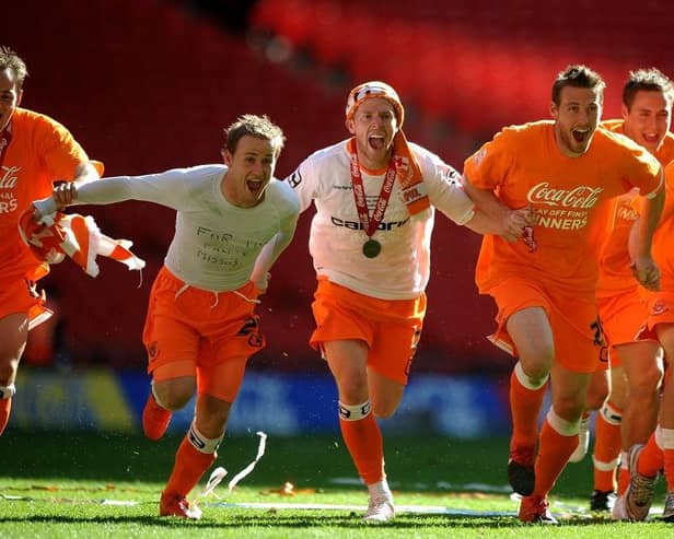 Rob Edwards celebrates winning promotion with Blackpool under Ian Holloway back in 2010