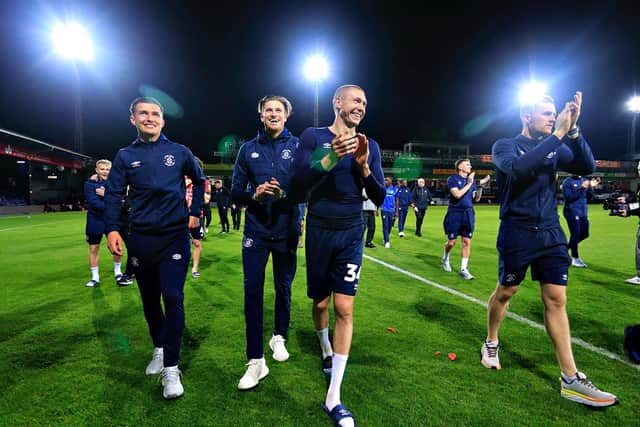 Dan Potts celebrates reaching Wembley with Reece Burke, Ethan Horvath and Jack Walton