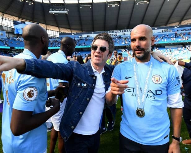 Former Oasis guitarist Noel Gallagher with Manchester City boss Pep Guardiola