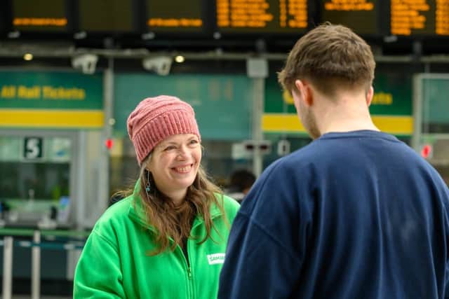 A Samaritans volunteer chatting to a member of the public. Picture: Samaritans