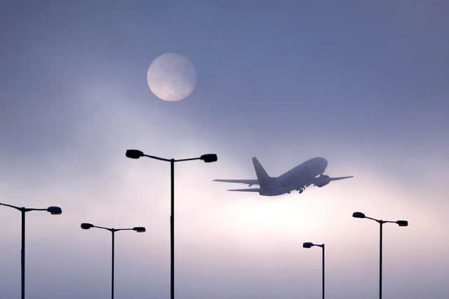 An aeroplane departs Luton airport. Photo by Oli Scarff/Getty Images