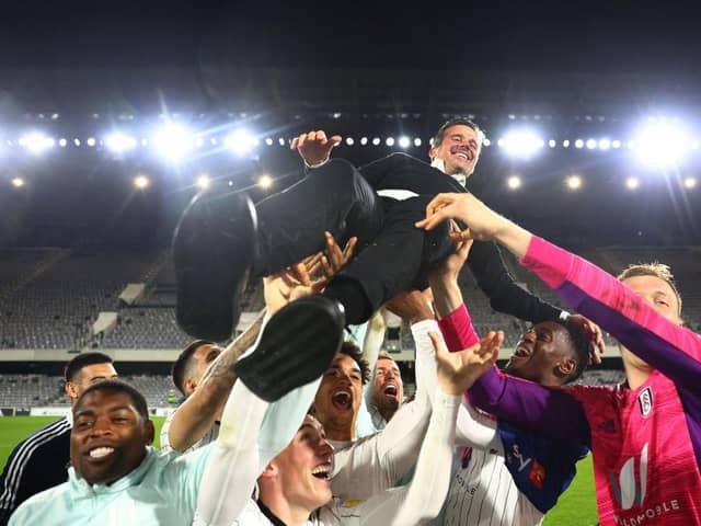 Fulham sealed promotion to the Premier League last night