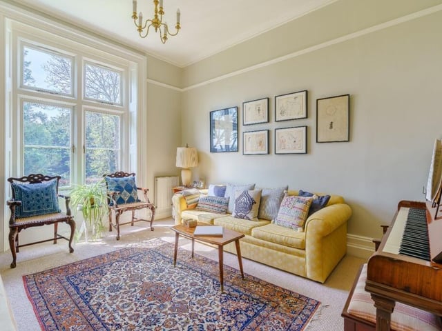 The family room is bright and air, with views of the garden outside.