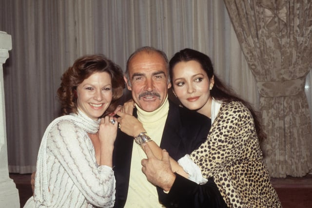 The 1983 James Bond was filmed at the Luton Hoo, Luton. The estate doubled as Shrublands, a health club which Bond is sent to by M to eliminate 'free radicals'. Pictured: Pamela Salem as Miss Moneypenny, Sean Connery and Barbara Carrera who played Fatima Blush.