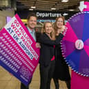 Wizz Air spin to win flight vouchers at London Luton Airport to celebrate Wizz Air reaching a 90 million passenger milestone. From left: Simon Harley, head of aviation at London Luton Airport, Marion Geoffrey, managing director of Wizz Air UK, and Eszter Rozsahegyi, head of Wizz Air ground operations. Picture: Matthew Power Photography
