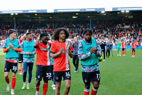 Pelly Ruddock Mpanzu applauds the Hatters faithful after the 2-1 victory over AFC Bournemouth recently - pic: Liam Smith