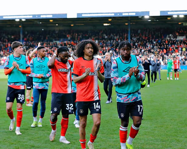 Pelly Ruddock Mpanzu applauds the Hatters faithful after the 2-1 victory over AFC Bournemouth recently - pic: Liam Smith
