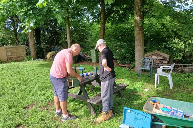 The bug hotels being built at Silsoe Horticultural Centre