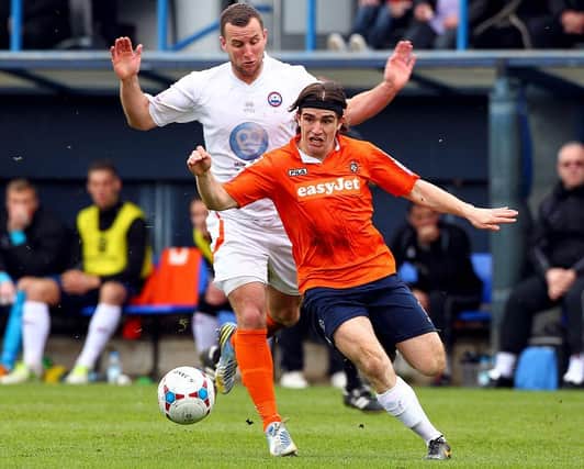 Former Luton midfielder Luke Rooney in action for the Hatters