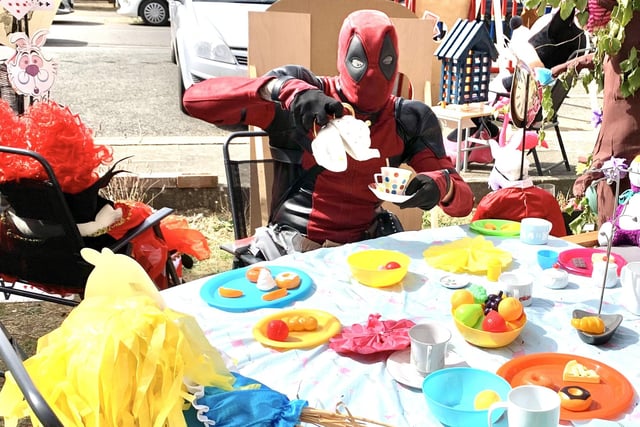 Luton's Deadpool at the Mad Hatter's tea party