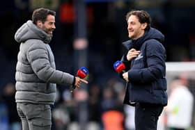Town defender Tom Lockyer shares a joke with fellow pundit Jamie Redknapp ahead of Luton's game with Manchester United on Sunday - pic: Shaun Botterill/Getty Images