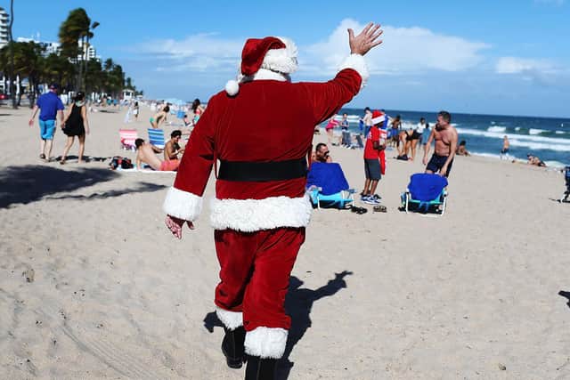 Swap winter chills for a Christmas on the beach...  (Photo by Joe Raedle/Getty Images)