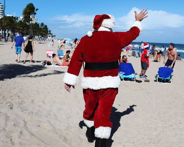 Swap winter chills for a Christmas on the beach...  (Photo by Joe Raedle/Getty Images)
