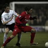 Kevin Foley tussles with Liverpool's Harry Kewell during his playing days at Kenilworth Road - pic: Tom Shaw/Getty Images
