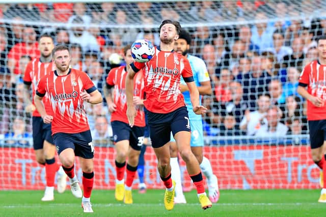 Harry Cornick is back in the starting line-up for Luton this evening