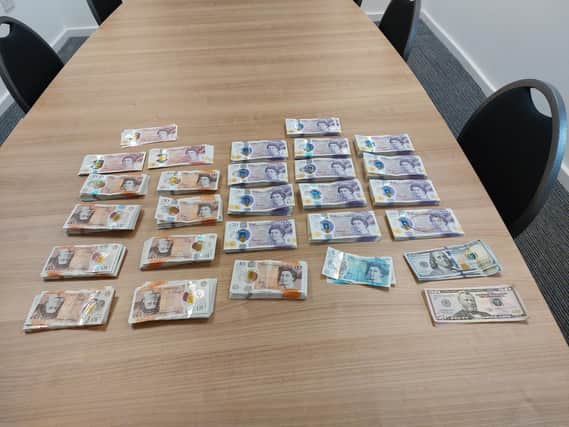Money taken from passengers by police. Picture: Luton Airport Police Unit