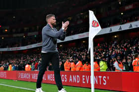 Luton boss Rob Edwards applauds the Hatters faithful at the Emirates last night - pic: Liam Smith