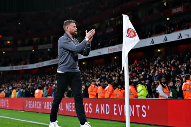 Luton boss Rob Edwards applauds the Hatters faithful at the Emirates last night - pic: Liam Smith