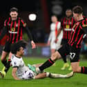 Tahith Chong is about to collide with AFC Bournemouth's Illya Zabarnyi after being fouled by Adam Smith - pic: Mike Hewitt/Getty Images